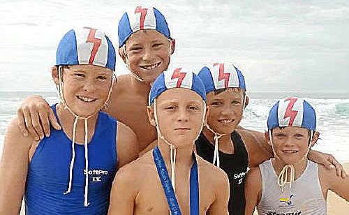 Silver medallist Max Shaw is congratulated by the four Mitchell boys on a great effort. Silver medallist Max Shaw is congratulated by the four Mitchell boys on a great effort.
